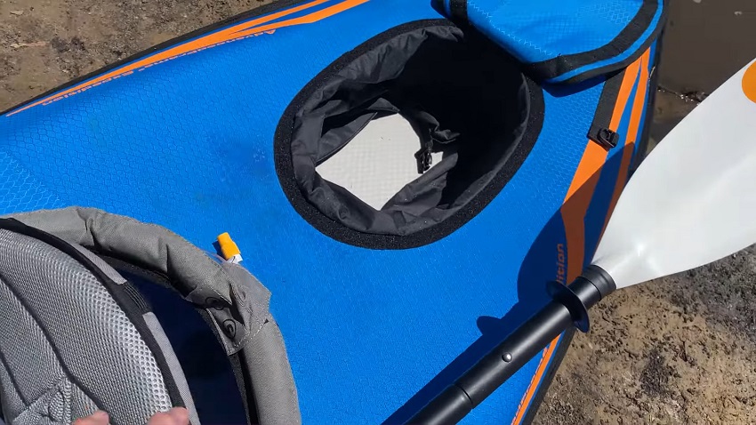 A storage compartment with a Velcro cover of the Advanced Elements AdvancedFrame Expedition Elite kayak