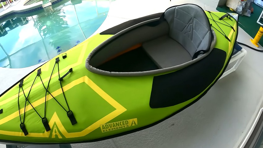 An open cockpit with neoprene pads of the Advanced Elements AdvancedFrame Ultralite kayak