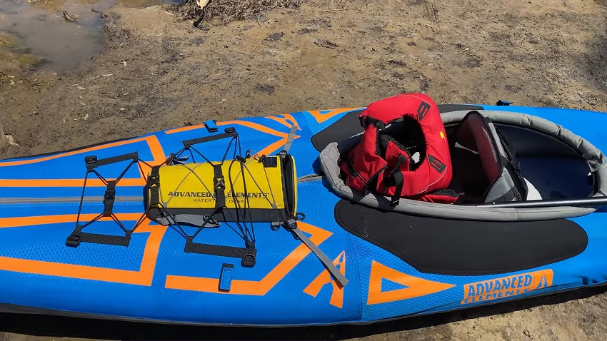 A bungee tie-down system with D-rings of the Advanced Elements AdvancedFrame Expedition Elite kayak