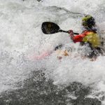 Kayak captured by whitewater