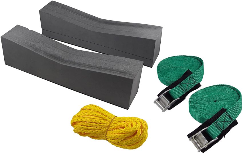 Two grey foam blocks, two green cam-buckle straps and a roll of yellow rope