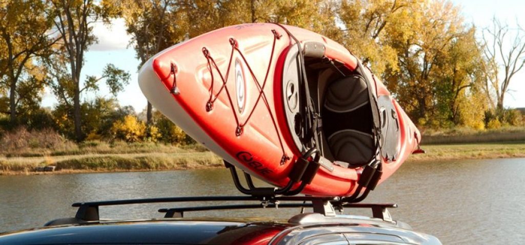 A kayak on top of a car