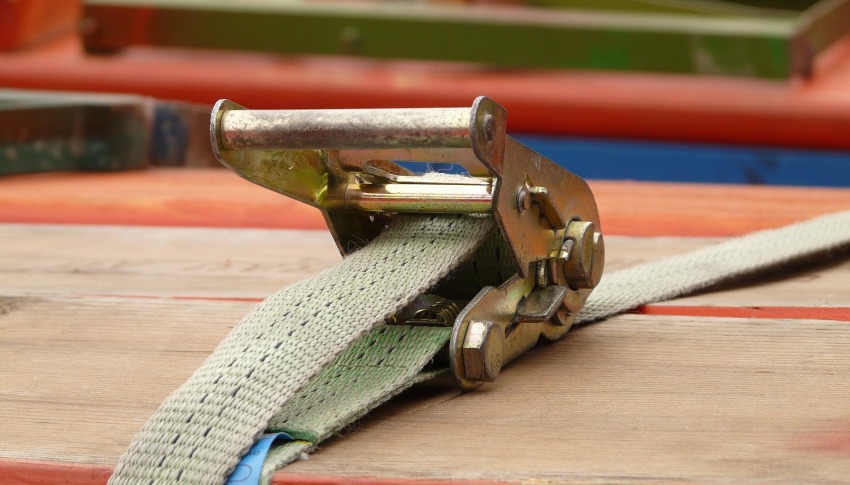 An olive strap with a ratchet buckle