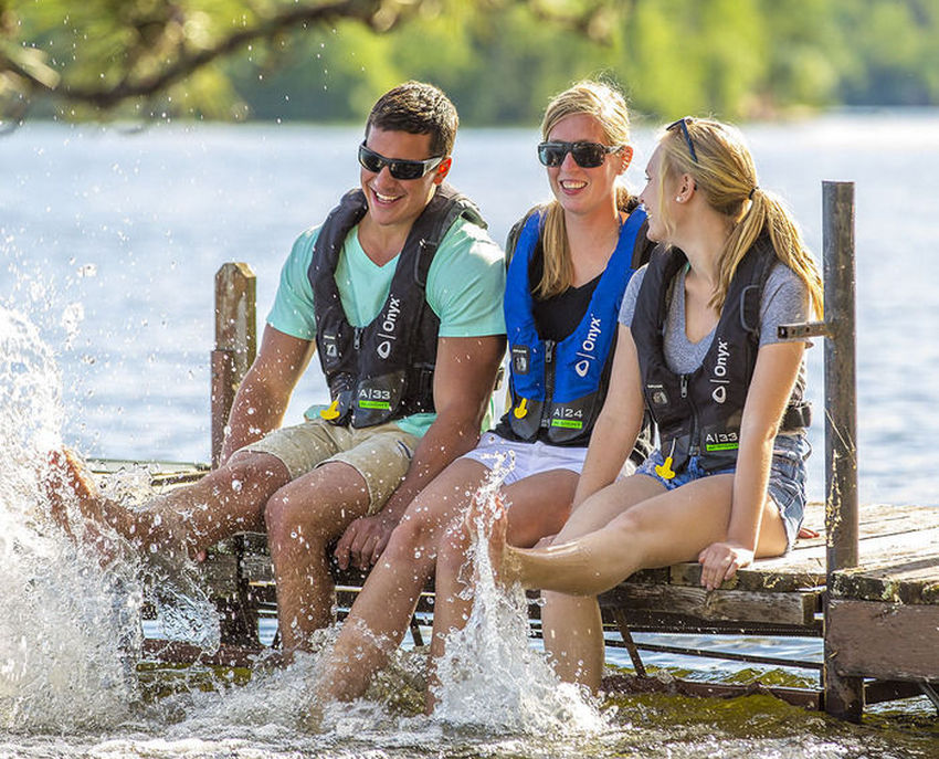 People in inflatable life vests