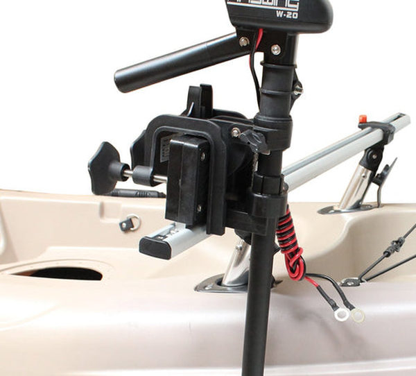 A trolling motor side-mounted to a kayak