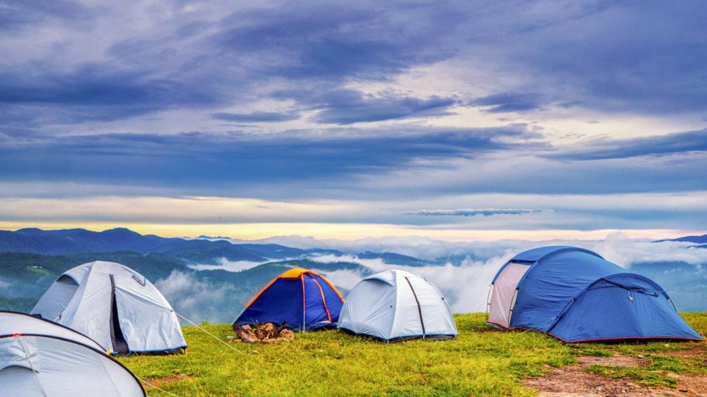 tents are pitched in the mountains