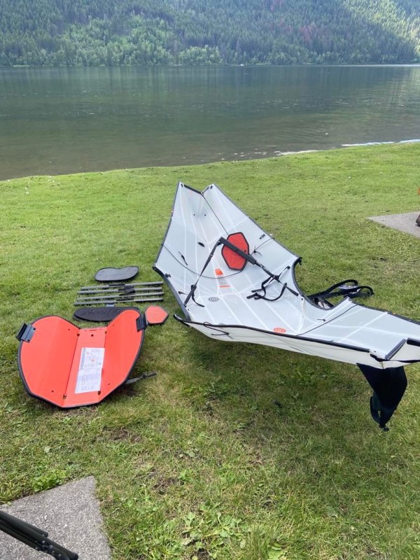 Half-assembled ORU Bay ST kayak lies on the grass
