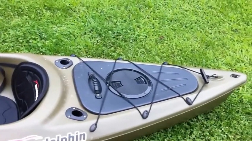 A removable storage compartment with a waterproof hatch and two rod holders of the Sun Dolphin Journey 12 SS kayak