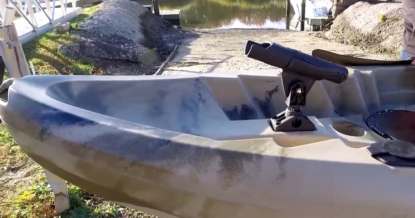 A t-handle and an articulating rod holder on the BKC TK219 kayak