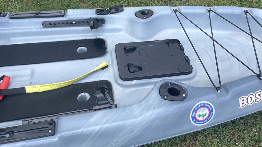 Two forward-facing flush-mounted rod holders and a large hatch area of the Sun Dolphin Boss 12 SS kayak