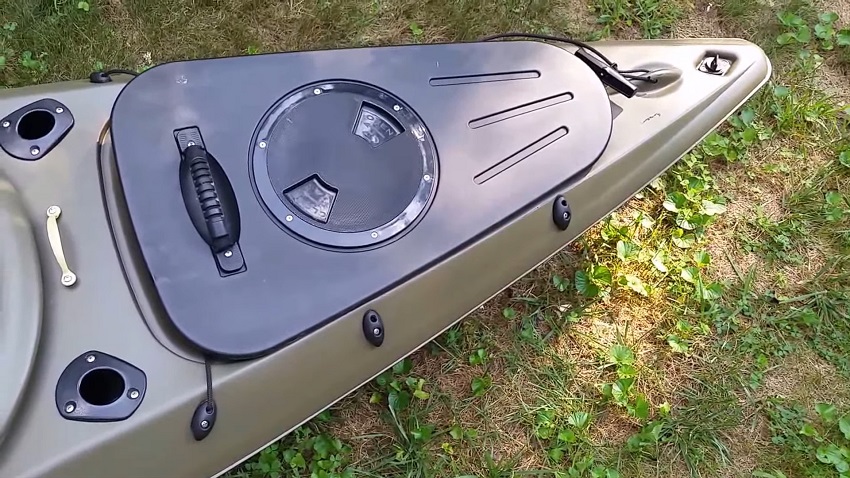 A removable storage area with a circular watertight hatch of the Sun Dolphin Excursion 12 SS kayak