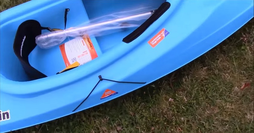 A paddle holder system of the Sun Dolphin Aruba 10 kayak