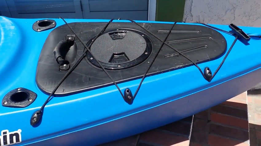 Two rod holders and a storage compartment with circular hatch of the Sun Dolphin Bali 12 SS kayak