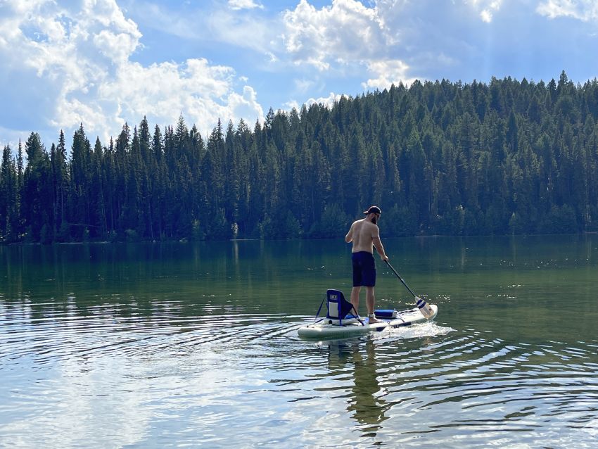 Author paddles the Isle Switch 2 in 1 Inflatable Kayak & Paddle Board, while standing on it