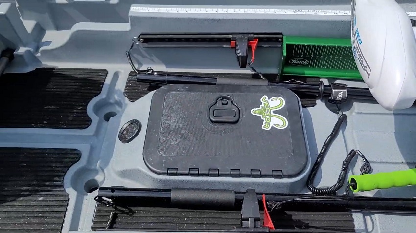 A storage box and a master controller for the Yak-Power system in the Ascend 133X kayak