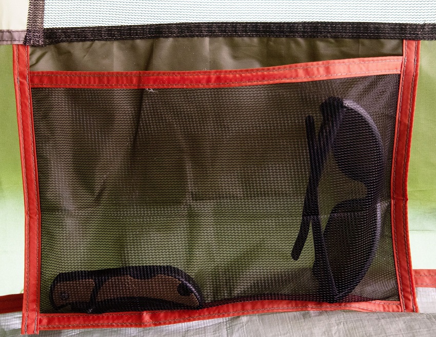 A mesh storage pocket inside the Ozark Trail 8-Person Dome Tunnel Tent, with Maximum Weather Protection