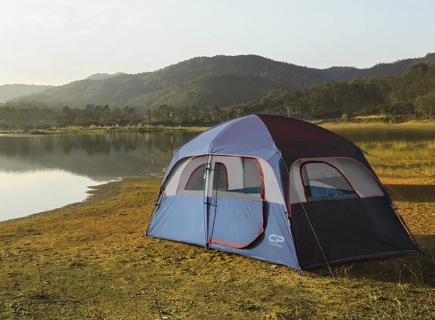 CAMPROS 6-Person Camping Tent pitched near a lake