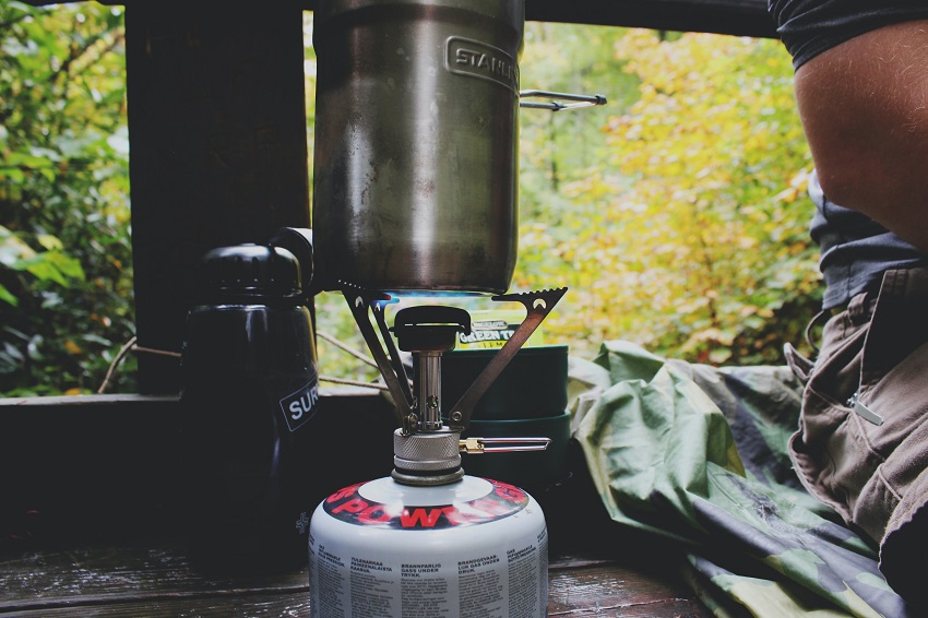 A gas stove inside a camping tent