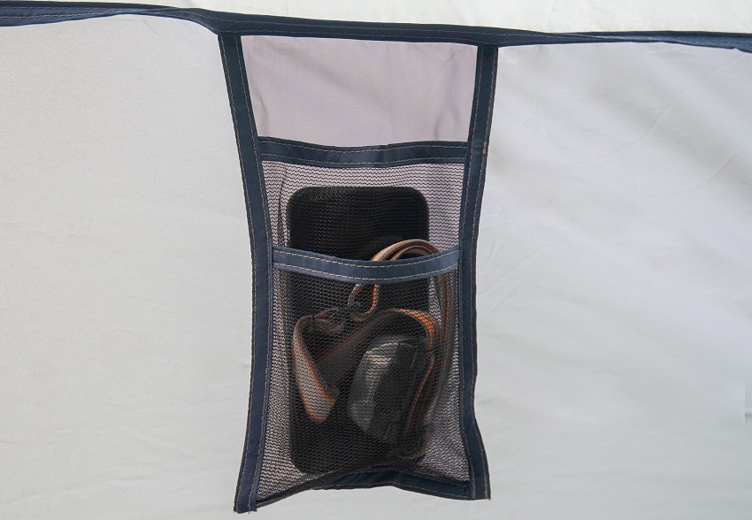 A wall mesh pocket inside the Ozark Trail 10 Person 3 Room Tent.