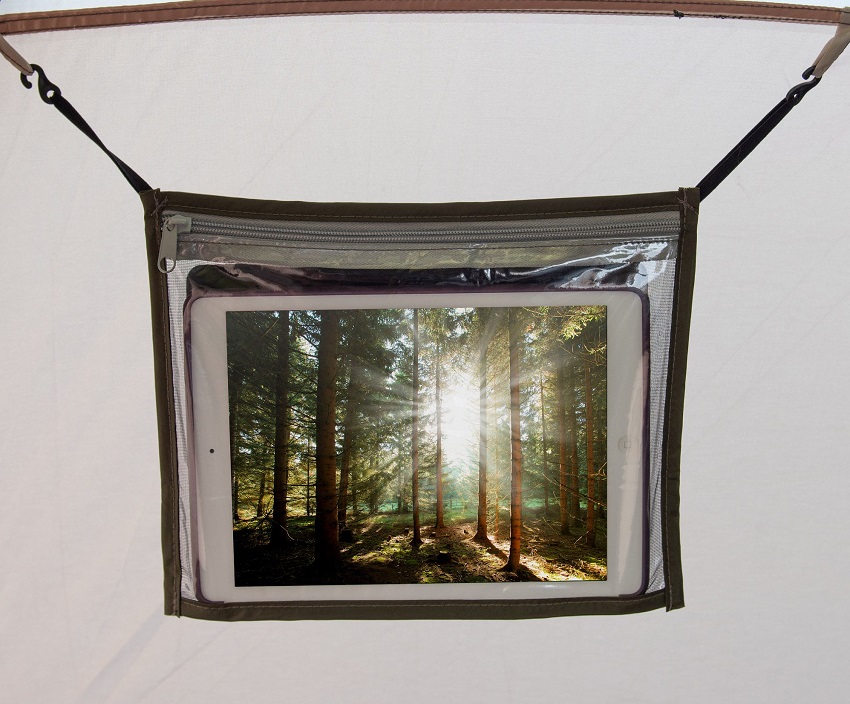 A hanging media pocket with adjustable straps inside the Ozark Trail Hazel Creek 20-Person Tunnel Tent