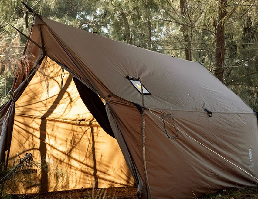 OneTigris TEGIMEN Hammock Hot Tent with open door pitched in the woods