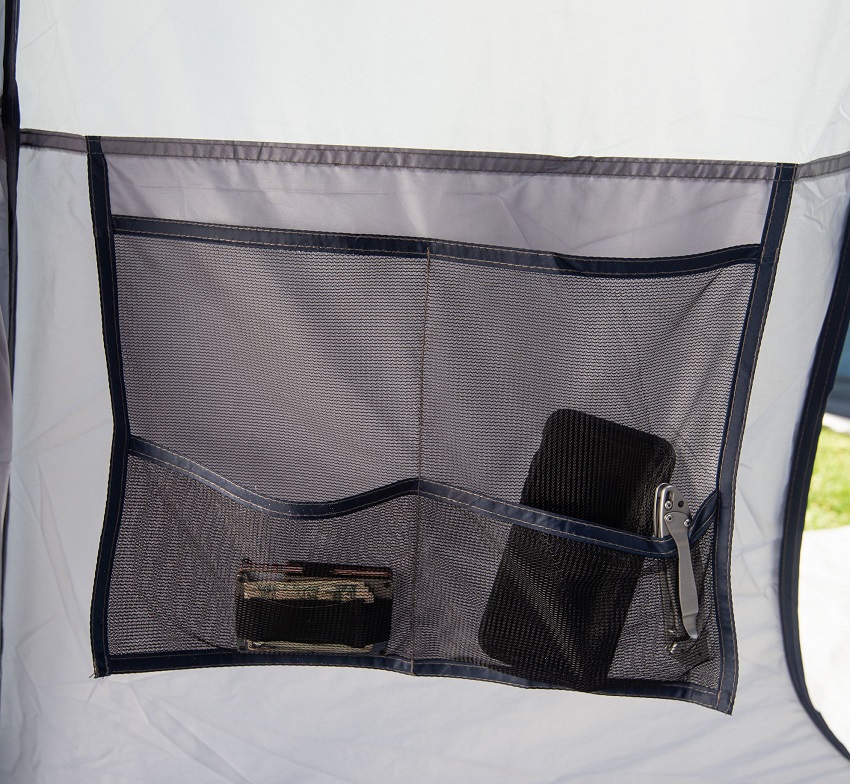 A two-section hanging pocket inside the Ozark Trail Hazel Creek 20-Person Star Tent