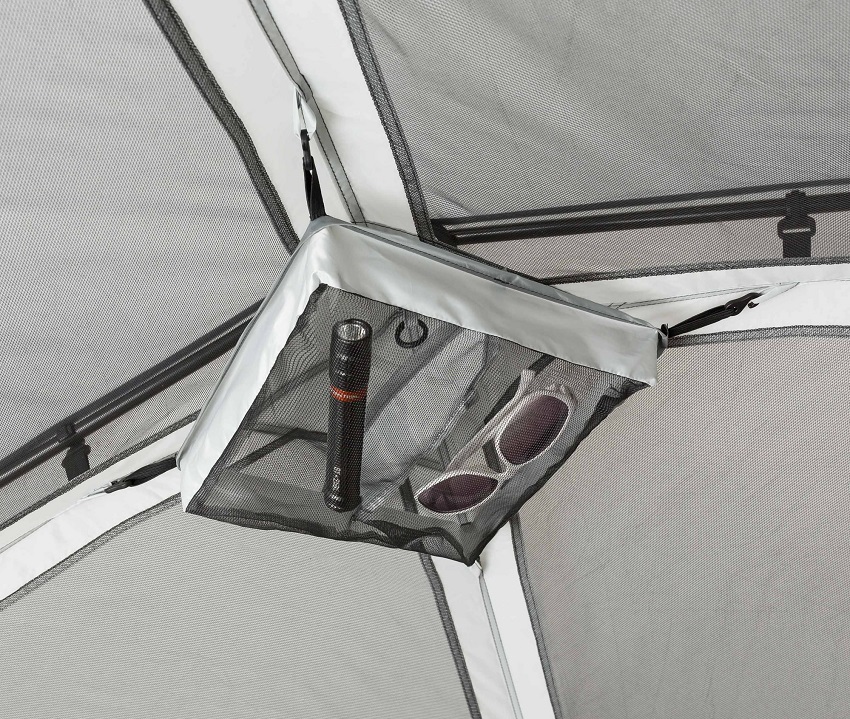 A hanging organizer for essentials inside the Ozark Trail 6-Person Instant Cabin Tent