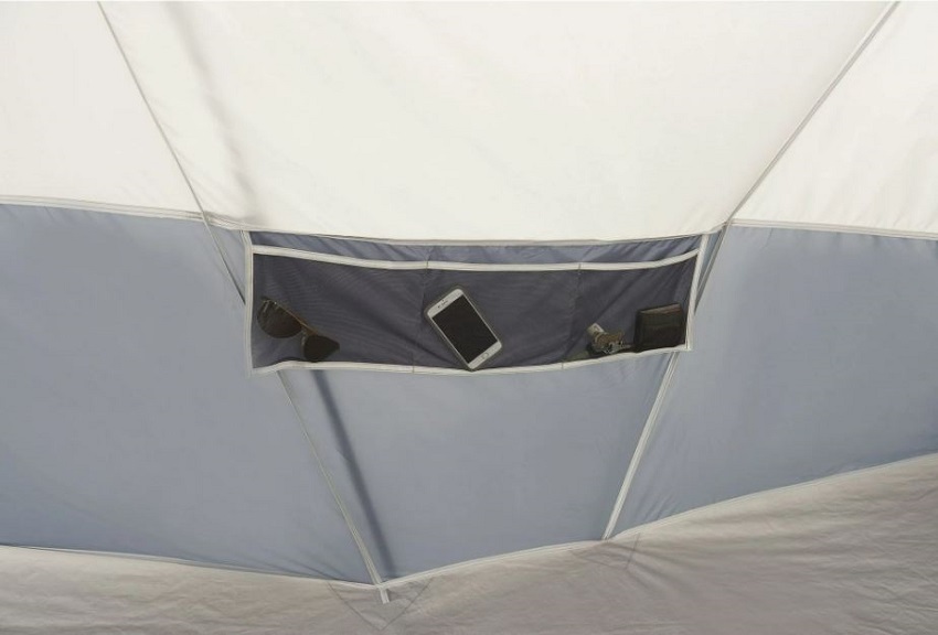 A hanging three-section pocket inside the Ozark Trail 20-Person Cabin Tent with 3 Separate Entrances