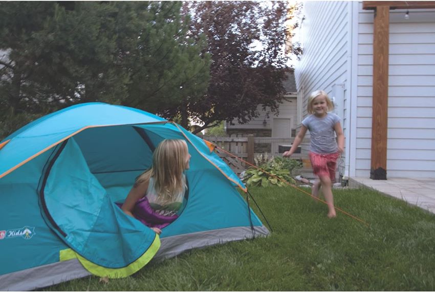 A girl and a woman play with the Coleman Kids Wonder Lake 2-Person Tent