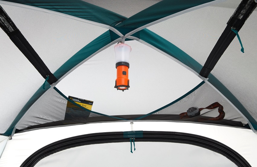 A hang loop with a lantern inside the REI Co-op Base Camp 4 Tent