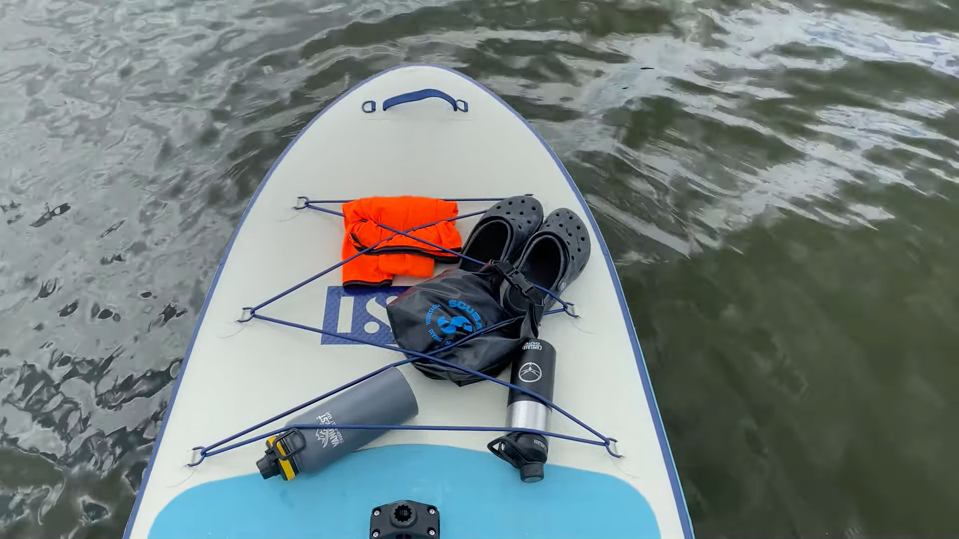 Watersports gear is fixed to the bow of ISLE Sportsman Sup