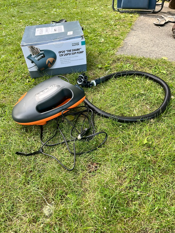 OutdoorMaster Shark II SUP pump is out of the box on the grass
