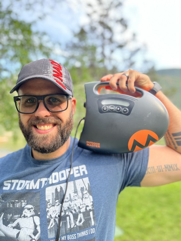 Author holds the OutdoorMaster Shark II electric pump 