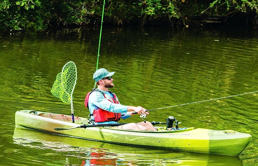 A man fishes from a sit-in fishing kayak